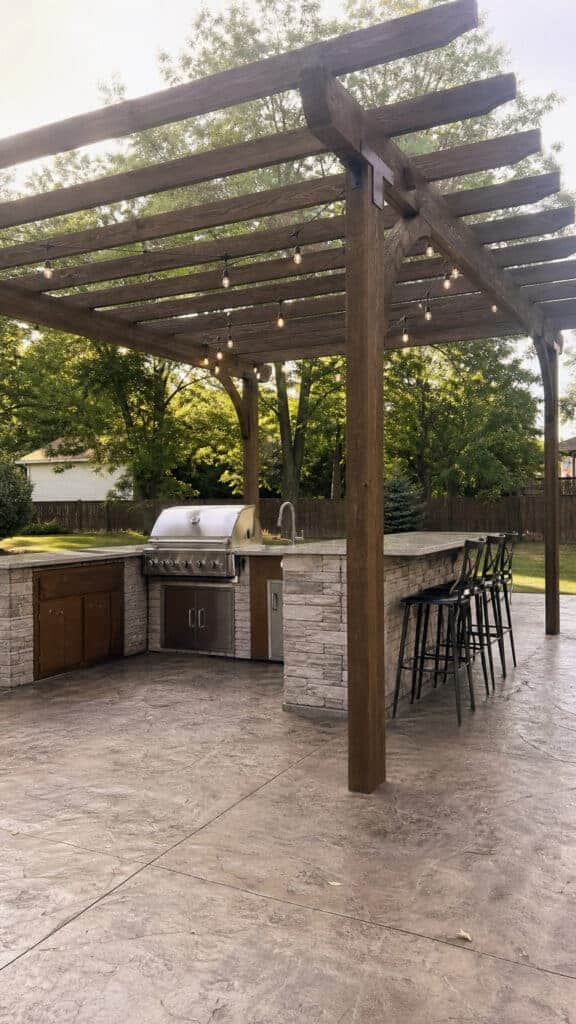 Pergola with Built-In Outdoor Kitchen Features