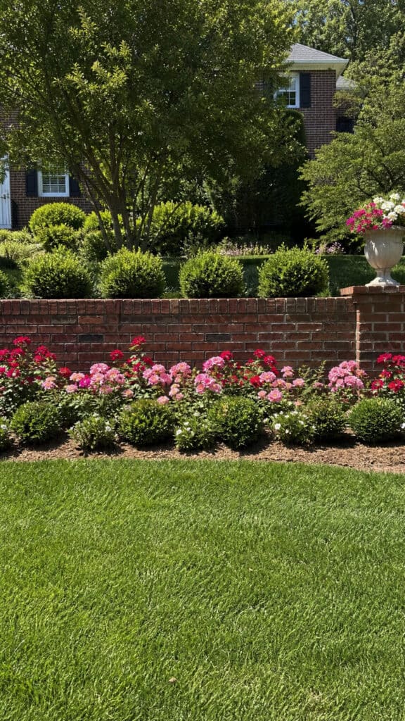 Brick Wall with Formal Flower Beds