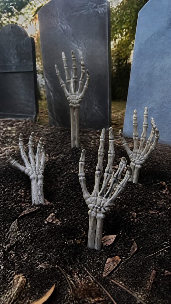 Skeleton Hands Reaching from the Ground