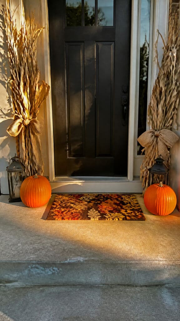 Create a Welcoming Fall Doormat Display