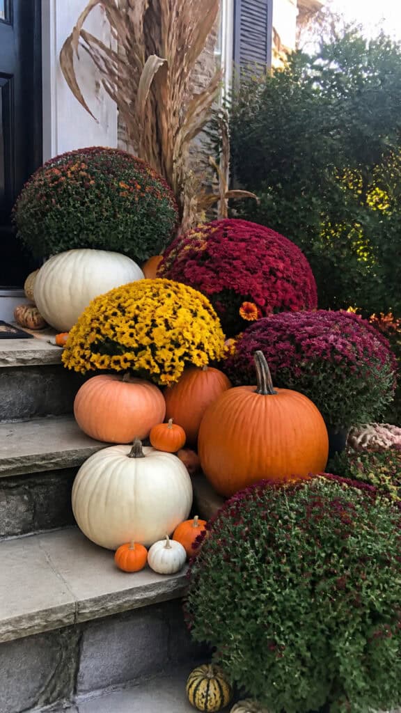 Layer Pumpkins and Mums for Maximum Impact